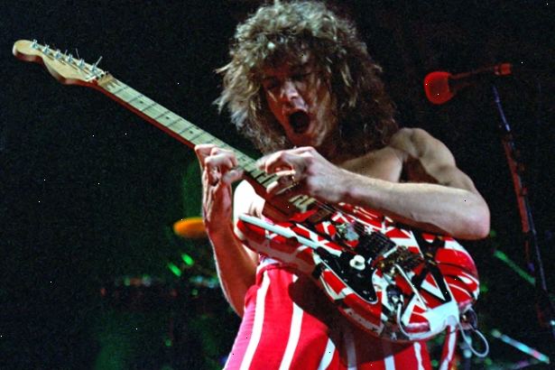 Hur man spelar gitarr som Eddie Van Halen. Placera din vänstra hand på greppbrädan som om du skulle spela normalt.